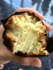 Digging into a Japanese sweet potato