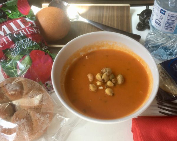 Airplane vegan lunch - tomato soup with bread and Emily's fruit crisps