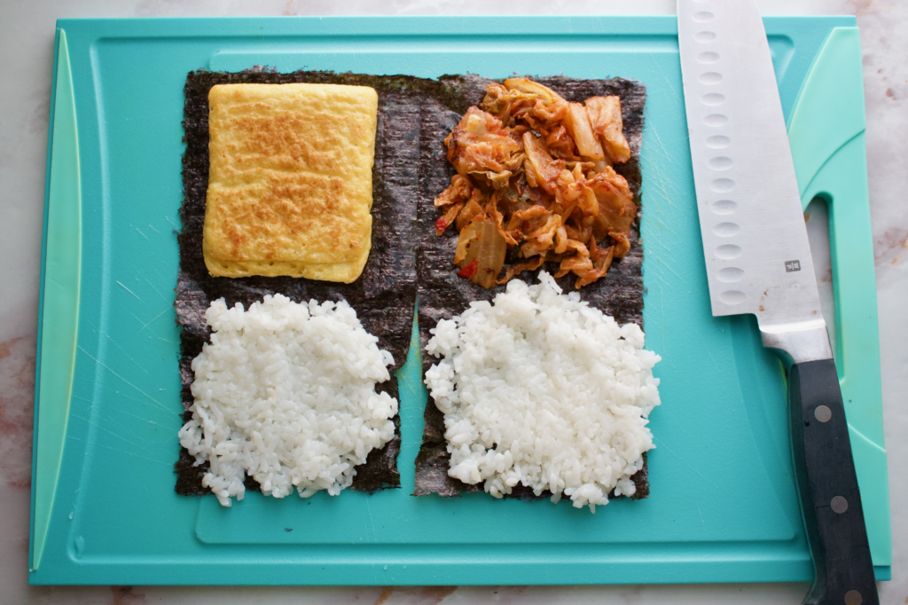 Dong Geu-Ra-Mi's Gimbap, four squares of the sushi nori filled with rice, egg and kimchi